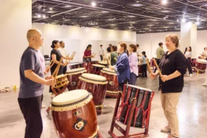 Experiencing a Japanese drum workshop at a company event