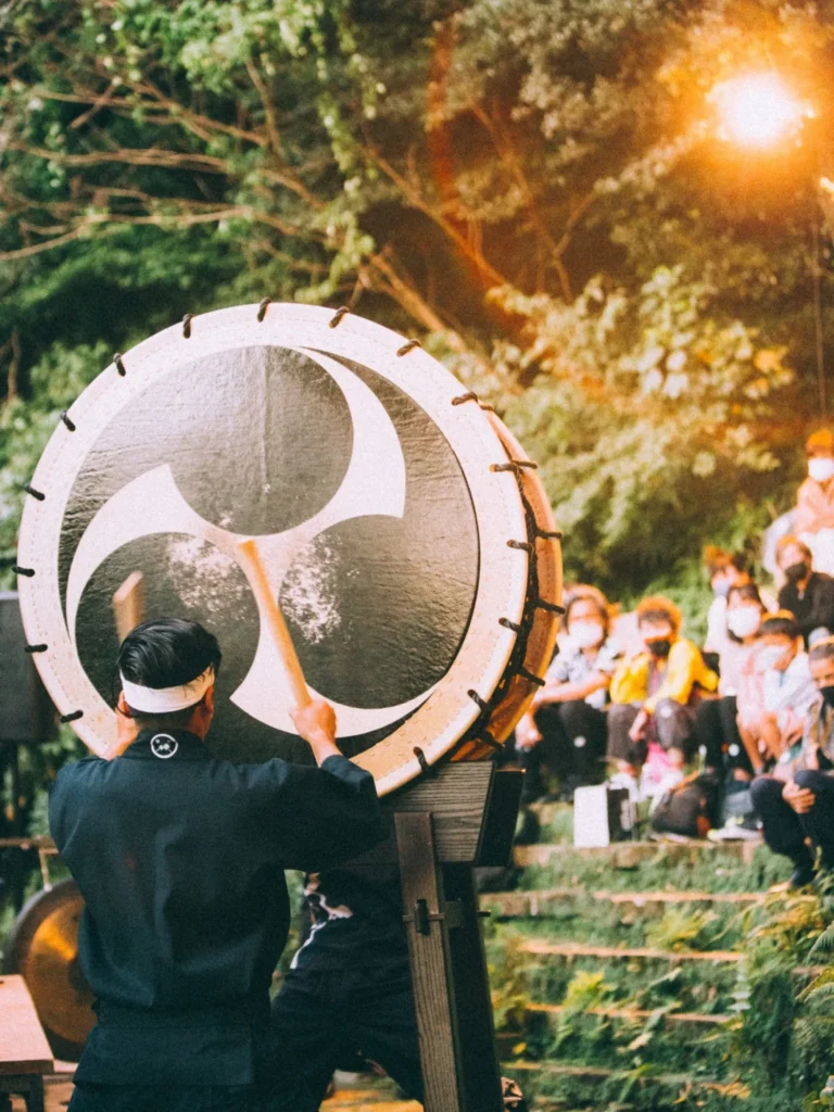 Creative taiko drumming performance held at a unique venue surrounded by nature