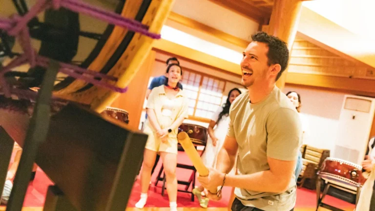 Participants beating large drums Odaiko