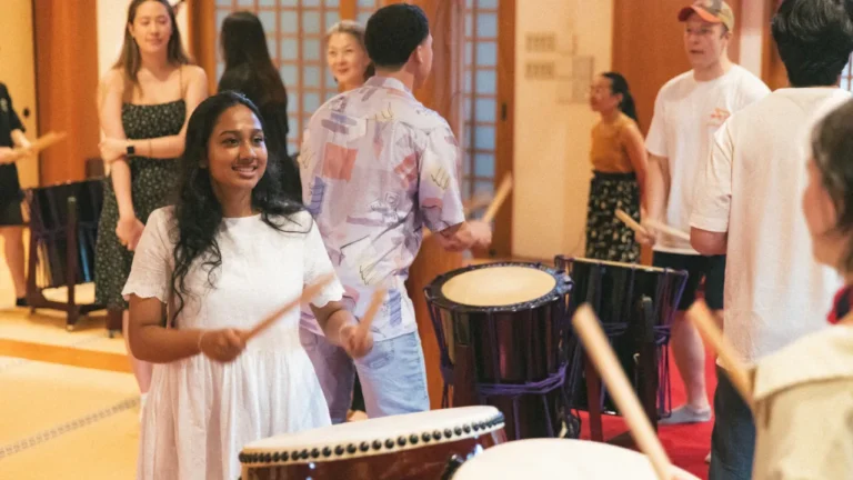Participants enjoying games using drums