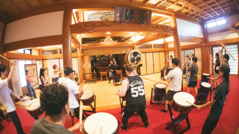 All participants try their hand at a Japanese drum ensemble.