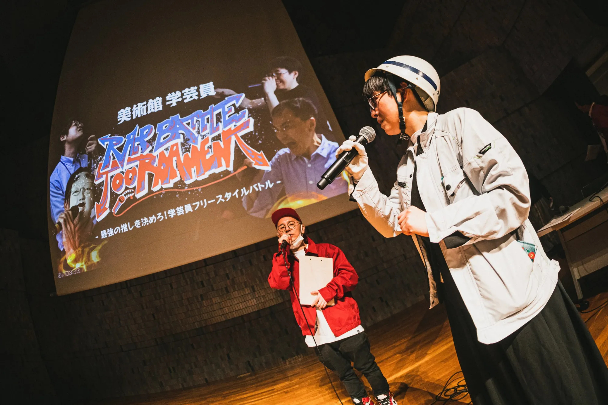 Curators performing rap at the event.