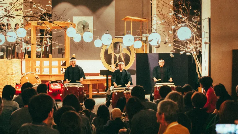 Collaborative performance of local folk songs and Japanese taiko drums at the hotel