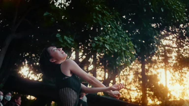Dancers performing at an outdoor theater